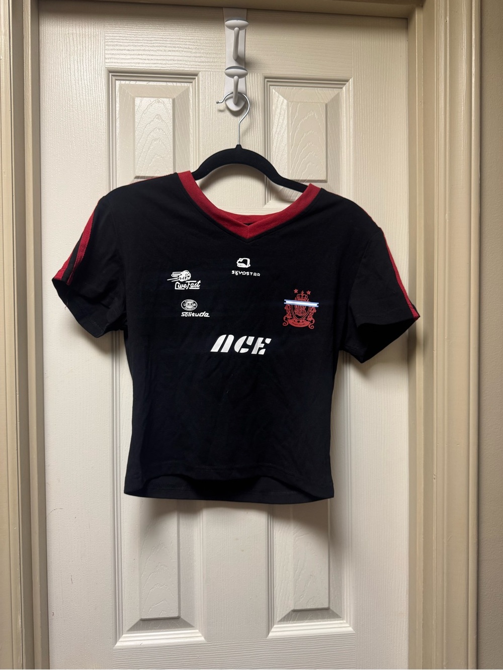 Fashion Nova Black Short Sleeve Tee with Red Trim and Crest size XL
